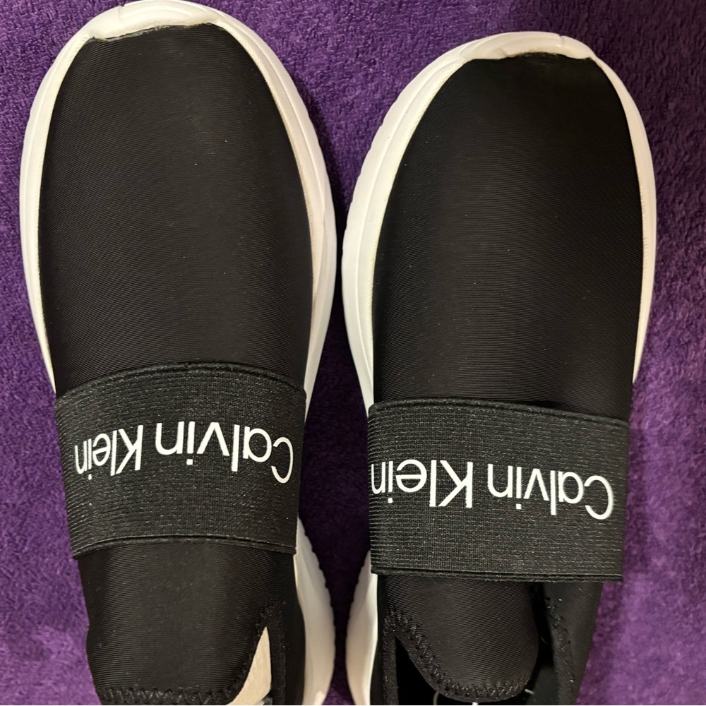 Brand new Calvin Klein slip on sneakers